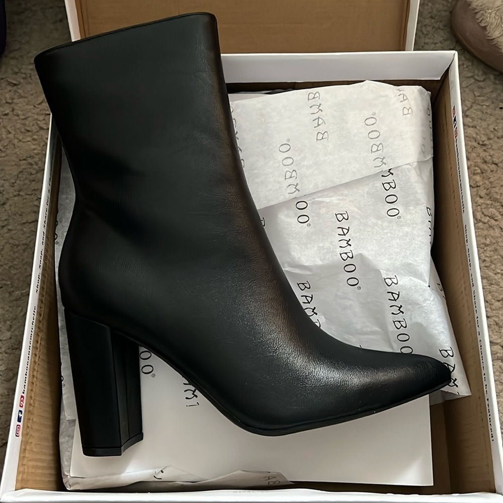 Black mid-calf booties